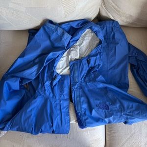 Blue north face windbreaker.